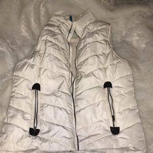 White vest with faux fur lined inside